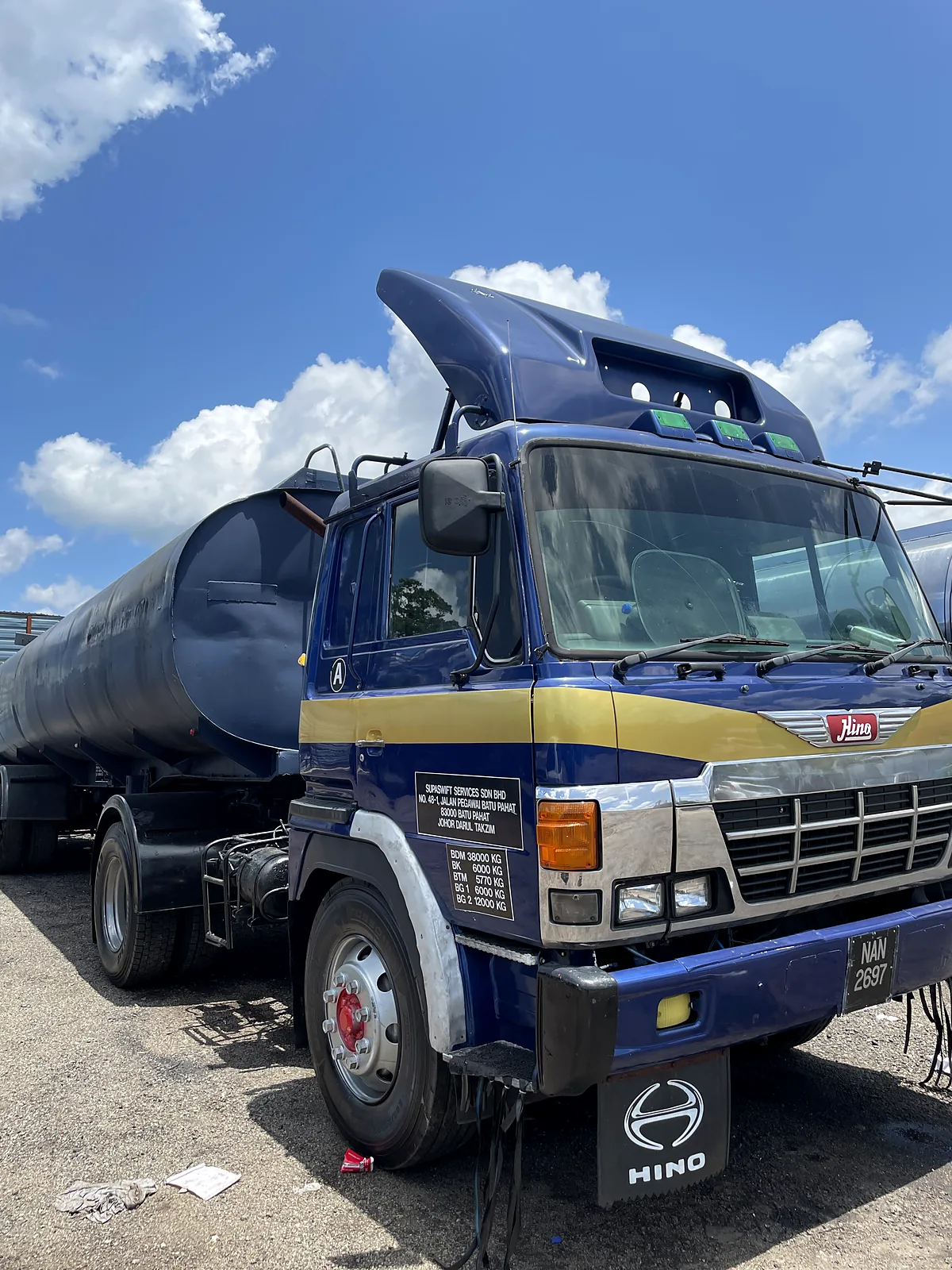 MSH Resources blue Hino prime mover with an insulated liquid tanker in Johor
