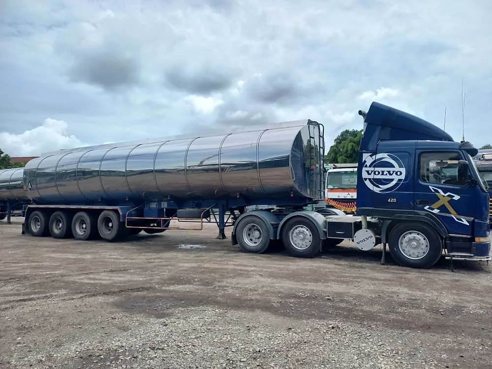Volvo prime mover with stainless tanker, side view