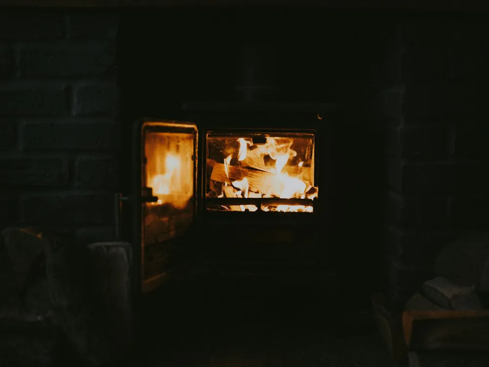 Flames burning inside an industrial furnace